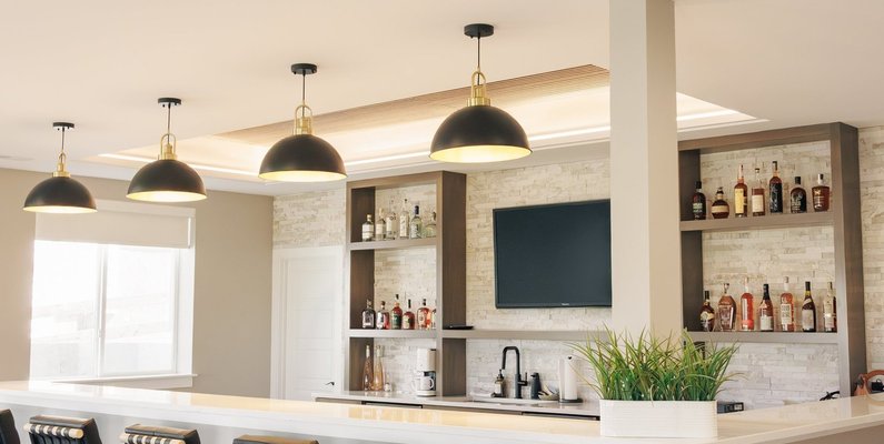 11. Modern Luxury Meets Function in This Custom Basement Wet Bar — Reither Construction