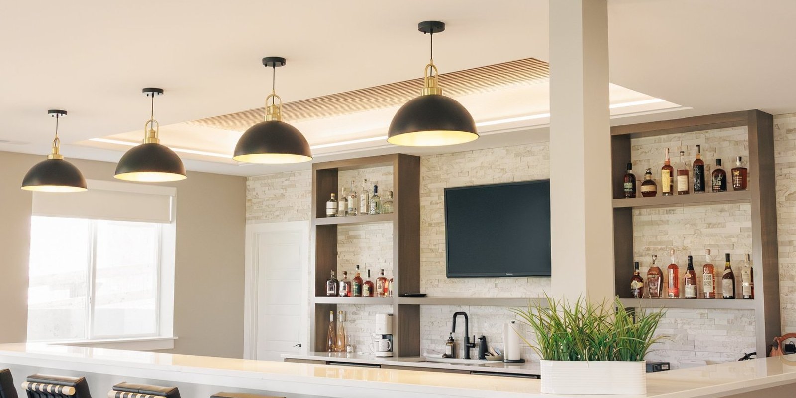 11. Modern Luxury Meets Function in This Custom Basement Wet Bar — Reither Construction