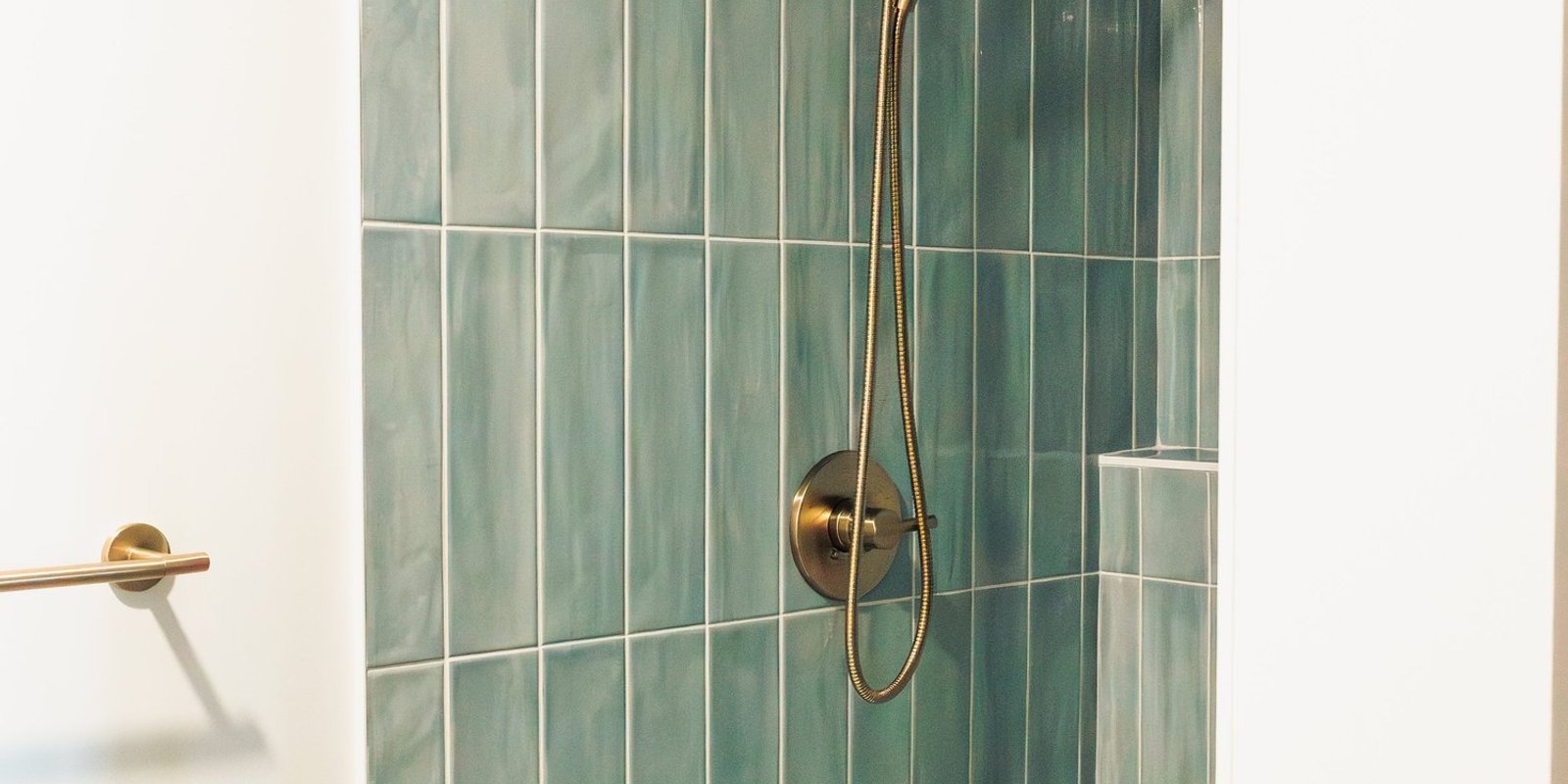 12. Small but Mighty: A Clever Under-Stair Shower in This Colorado Basement Remodel — Reither Construction
