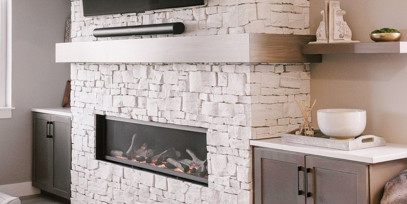 13. Warmth & Style: A Gas Furnace-Rated Fireplace That Defines Colorado Basement Remodeling — Reither Construction