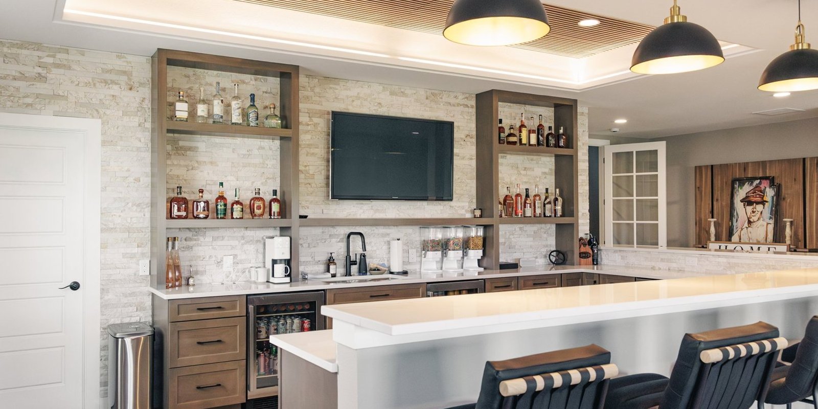 15. A Host’s Dream: Colorado Basement Bar with Tray Ceiling and Wood Slat Elegance — Reither Construction
