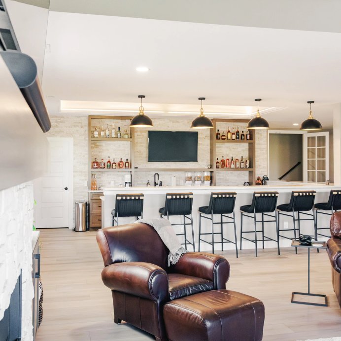 Elevated Entertaining basement home bar in Castle Rock by Reither Construction, view 5