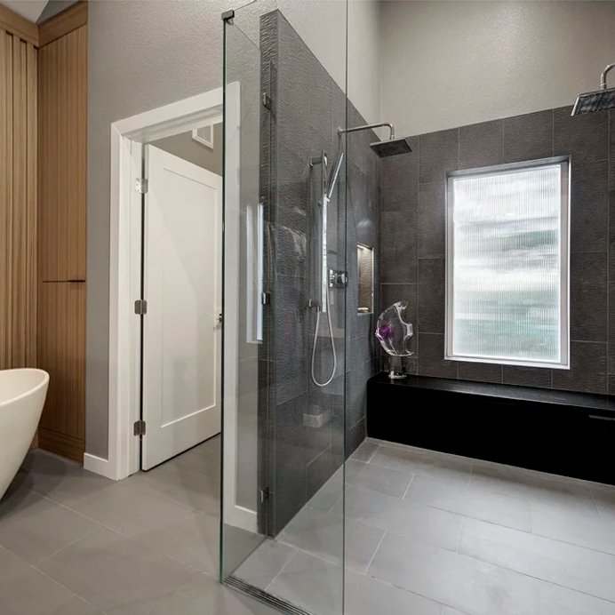European Sleek bathroom remodel in Parker by Reither Construction, view 2